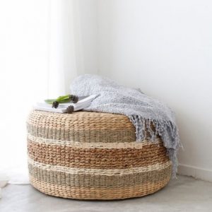 Round seagrass ottoman pouf in a natural colour, handwoven in Vietnam