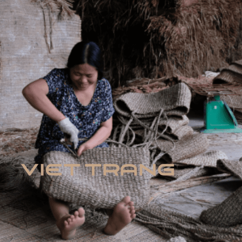 artisan with woven handbag