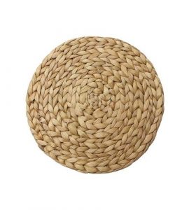 Round water hyacinth placemat with a spiral weave, handwoven in Vietnam.