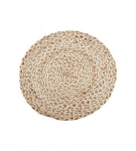 Round jute placemat with a coiled weave, handwoven in Vietnam.