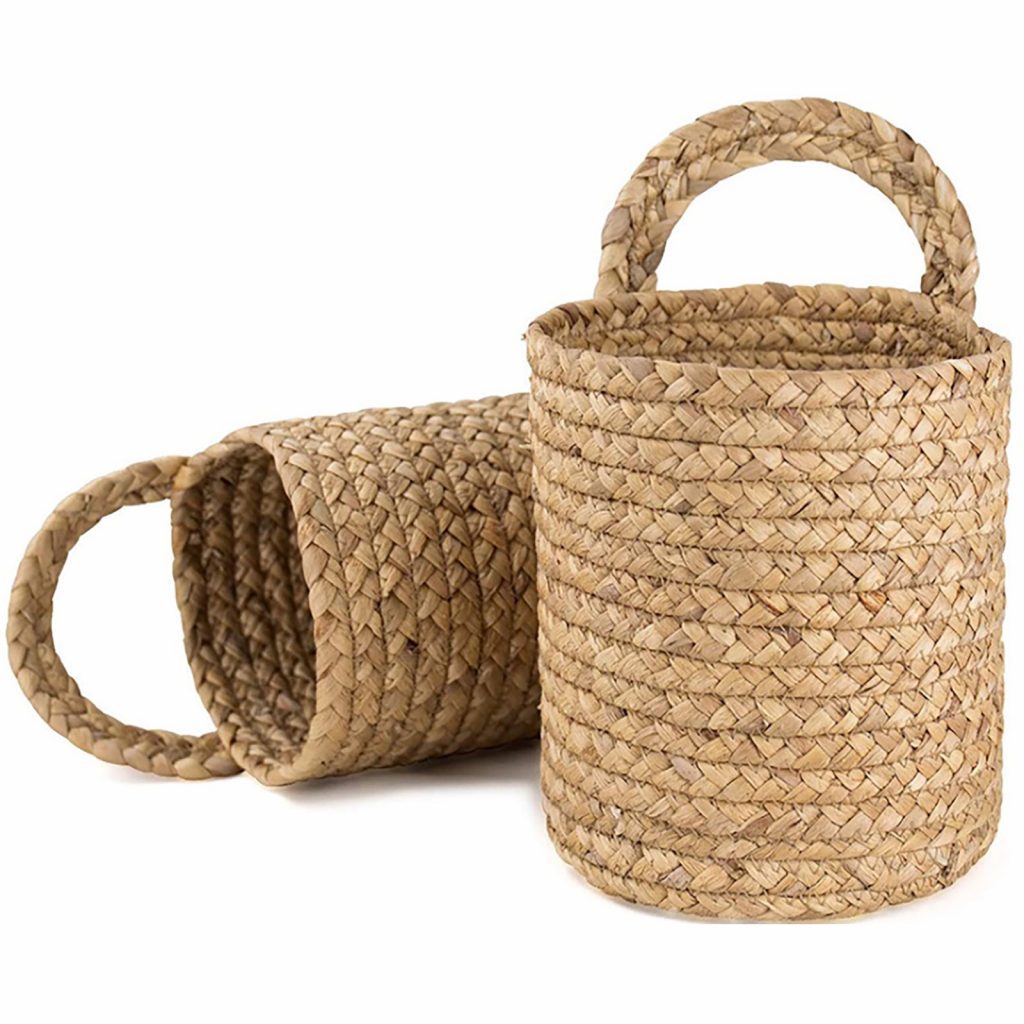 Handwoven water hyacinth baskets with braided handles.