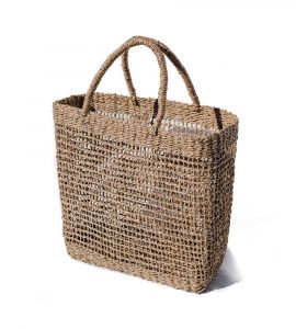 Seagrass shopping handbag with an open net weave and braided handles, handwoven in Vietnam.