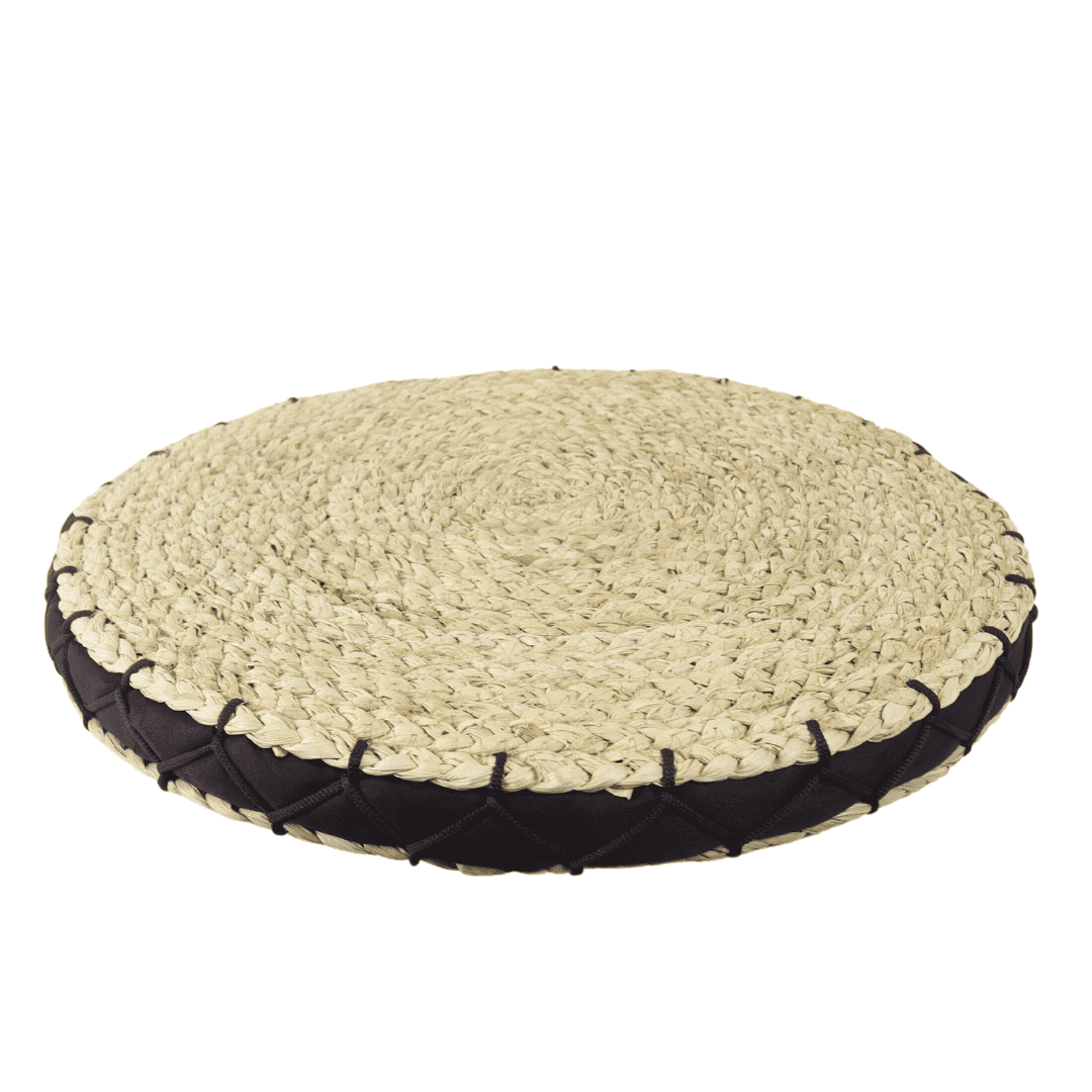 Round floor pouf woven from corn husk leaf, handmade in Vietnam.